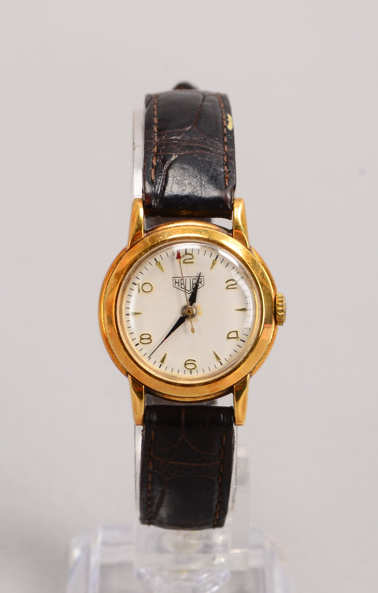 Damenarmbanduhr (Schweiz), Heuer, 14 kt Gold-Gehäuse, Lederarmband nicht original, Handaufzug