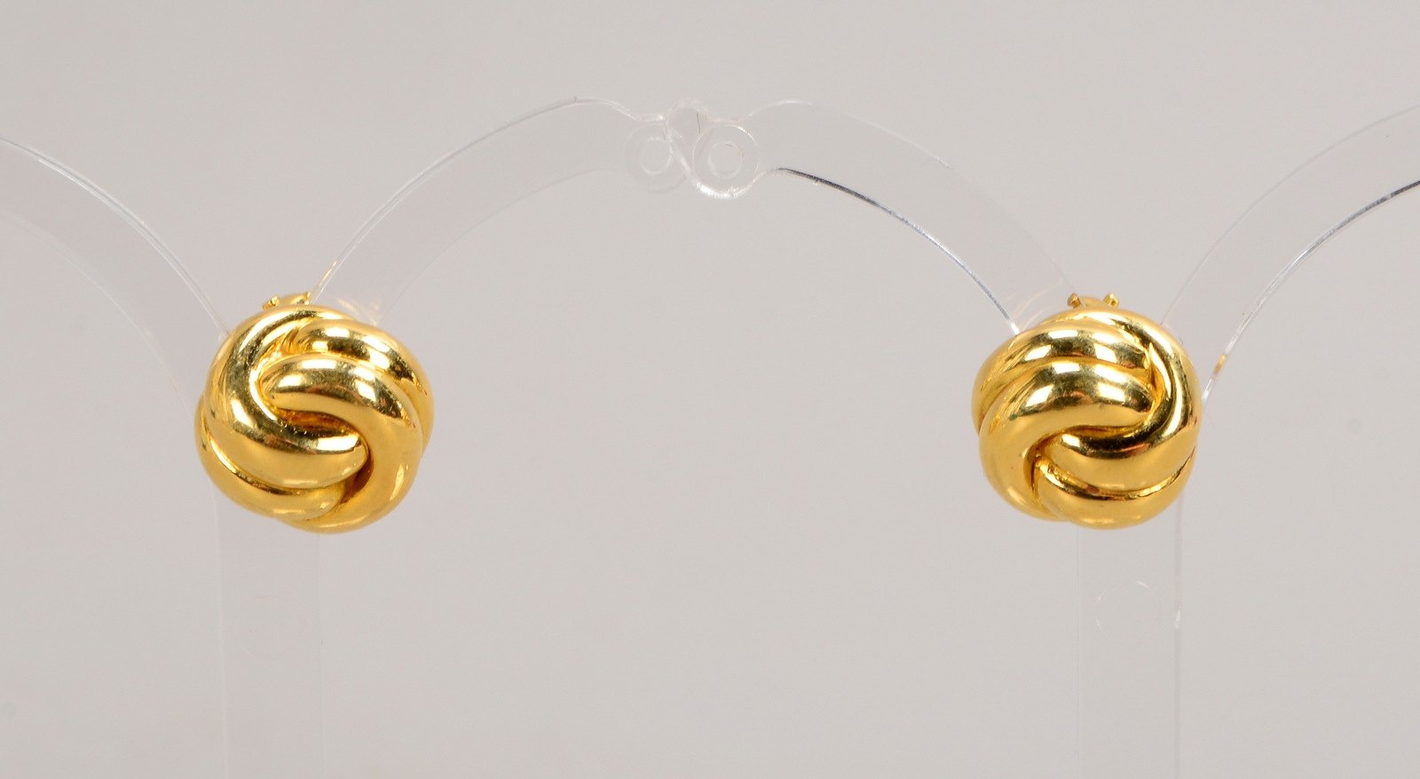 Paar Ohrclips, 750 GG (gest.), in Knotenform; Durchmesser Ø 13 mm