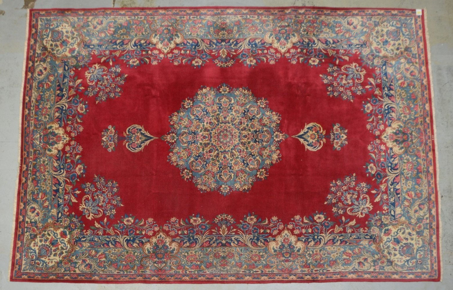 Kirman, feine Knüpfung, Schmalseite mit arabischer Nummerierung, guter Flor