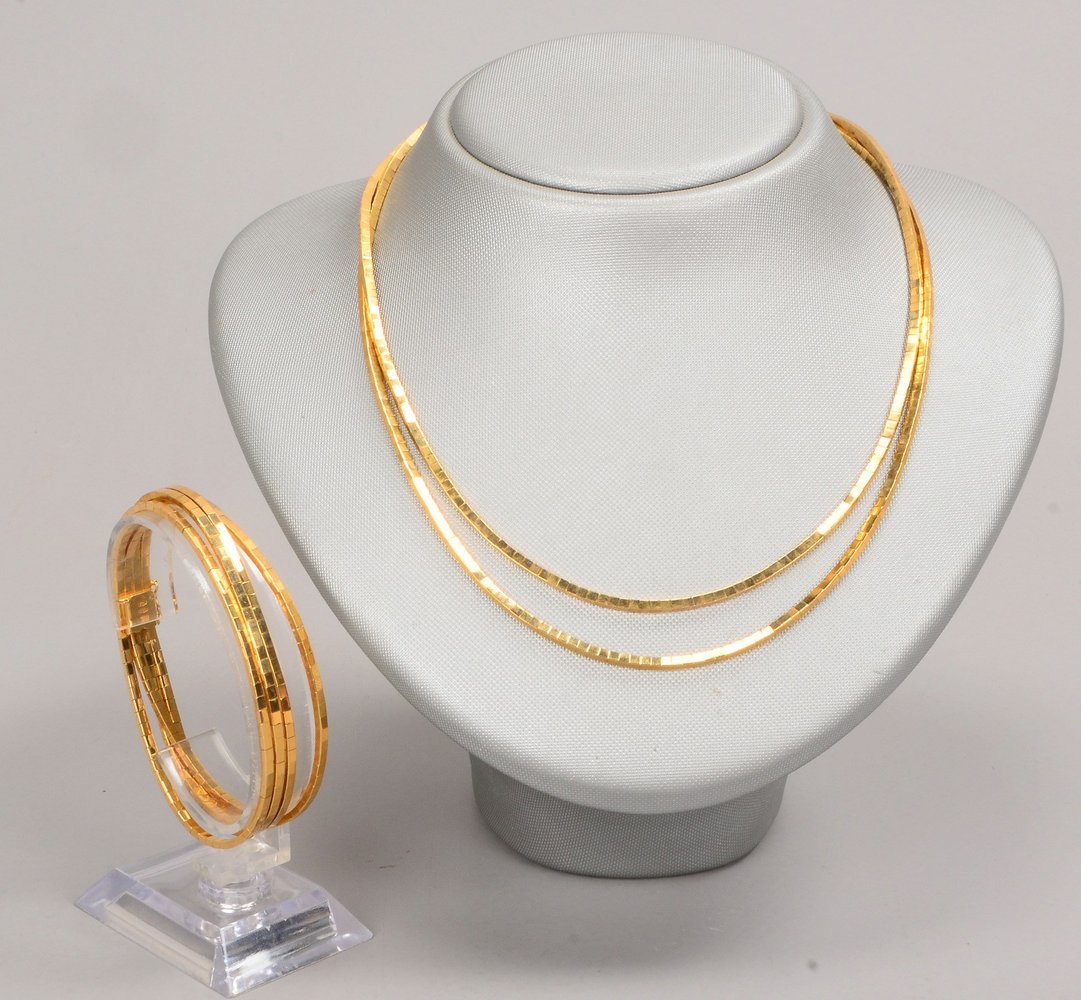 Schmuckset, 750 GG (gest.): Collier, 2-strängig, und Armband, 4-strängig