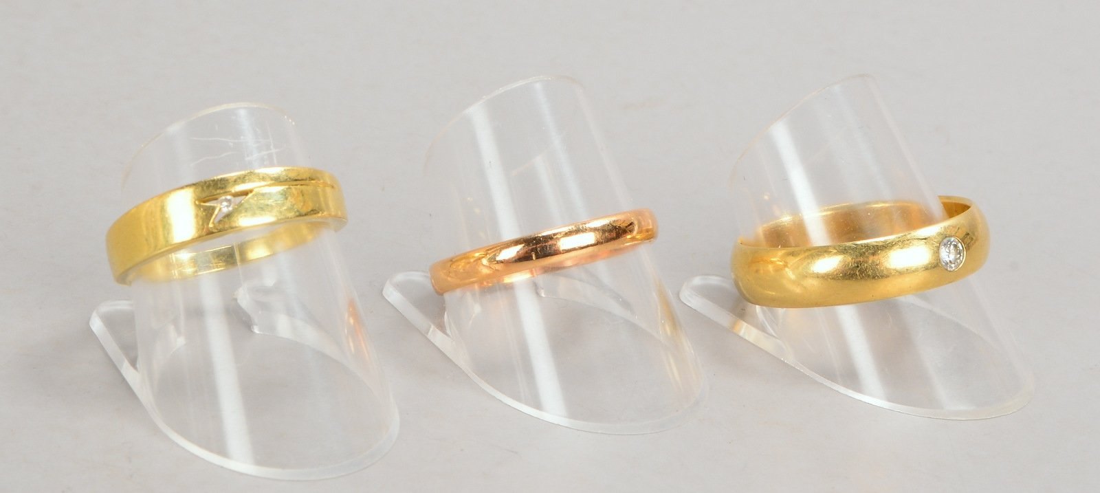 3x Goldringe, 585 GG (gest.), versch. Ausf./teils mit Diamantbesatz; Gew. zus. 10,20 g