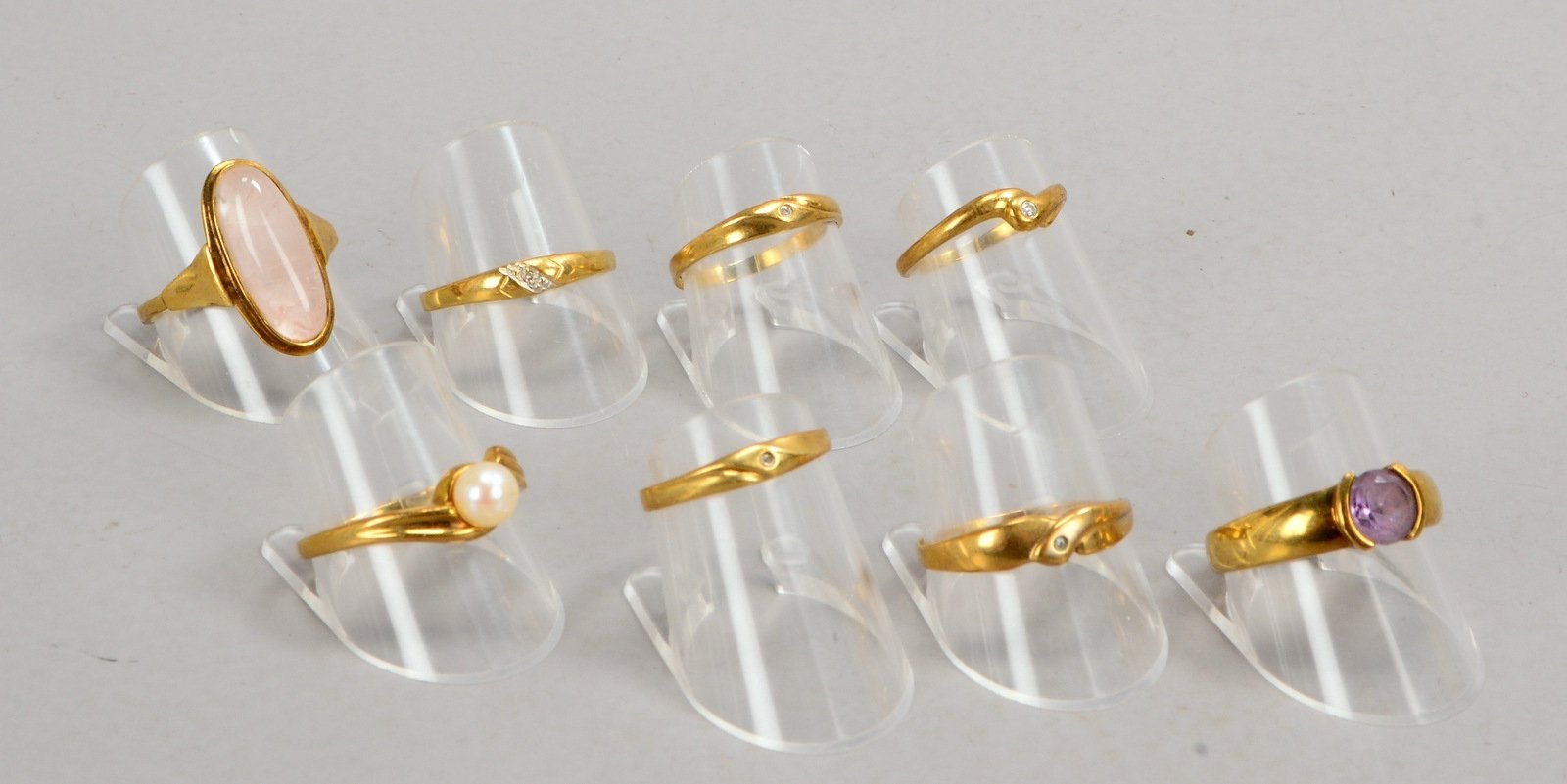 8x Goldringe, 333 GG, versch. Ausf./teils mit Steinbesatz; Gew. zus. 13,50 g
