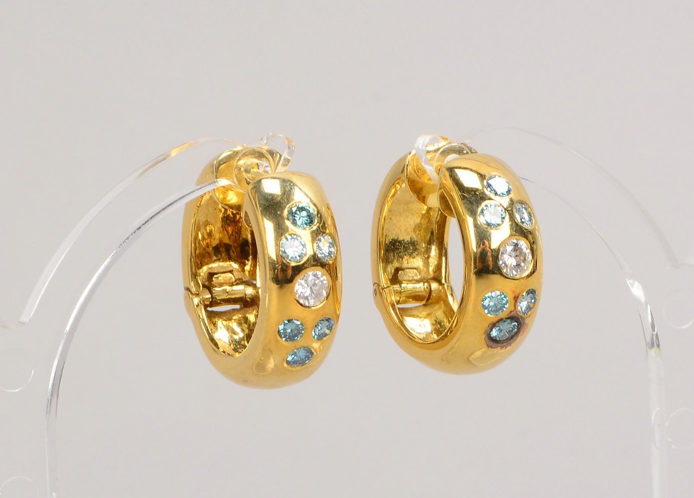 Paar Creolen, 585 GG (gest.), mit insges. 14x Brillanten/zus. ca. 0,087 ct