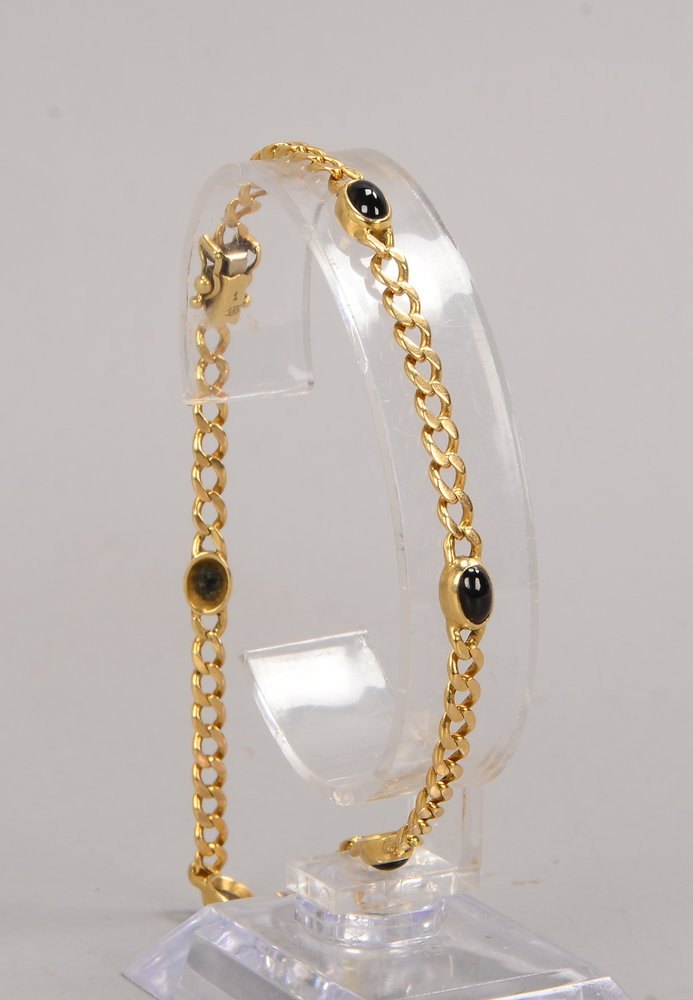 Armband, 585 GG (gestempelt), mit 5-fachem Onyxbesatz, Steine im Cabochonschliff, mit Steckschließe