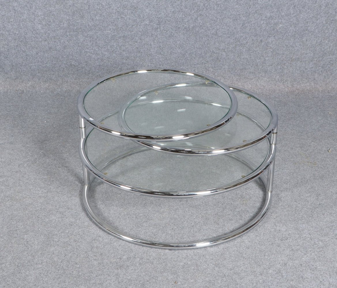 Designer-Beistelltisch, Chrom und Glas, 3-stuf. runde Ablagen/bewegl.; Ø 76 cm