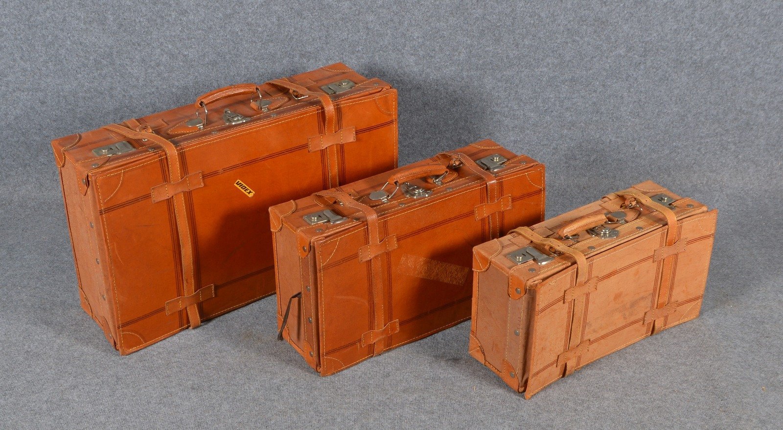 Vintage-Reisekofferset, 3-teilig, Leder, mit Gürteln/Schnallen; versch. Maße