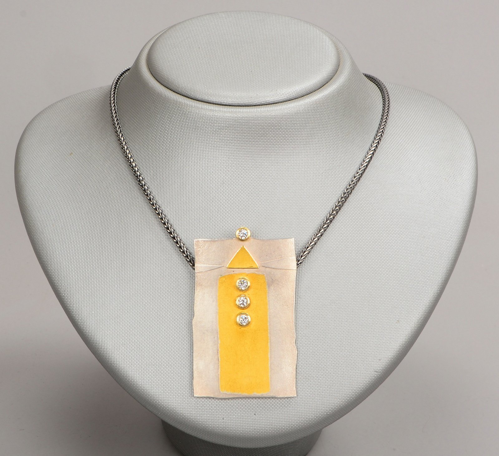 Designer-Collier, 925 Silber/Gold-Anhängerplatte mit 4x Brill./zus, ca. 0,60 ct