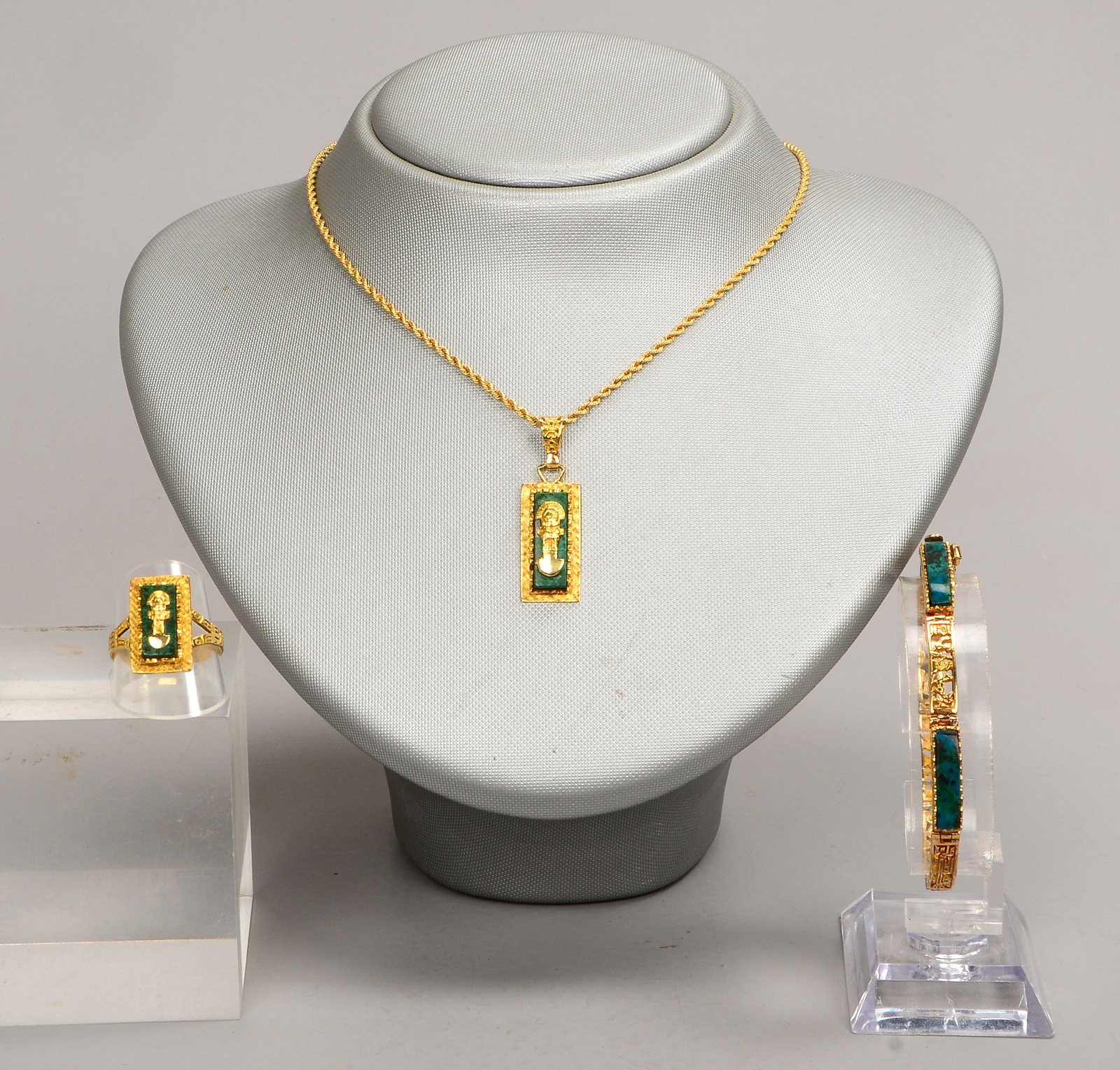 Schmuckset, 750 GG (gest.), mit Malachitbesatz: Kette/Anhänger, Armband und Ring