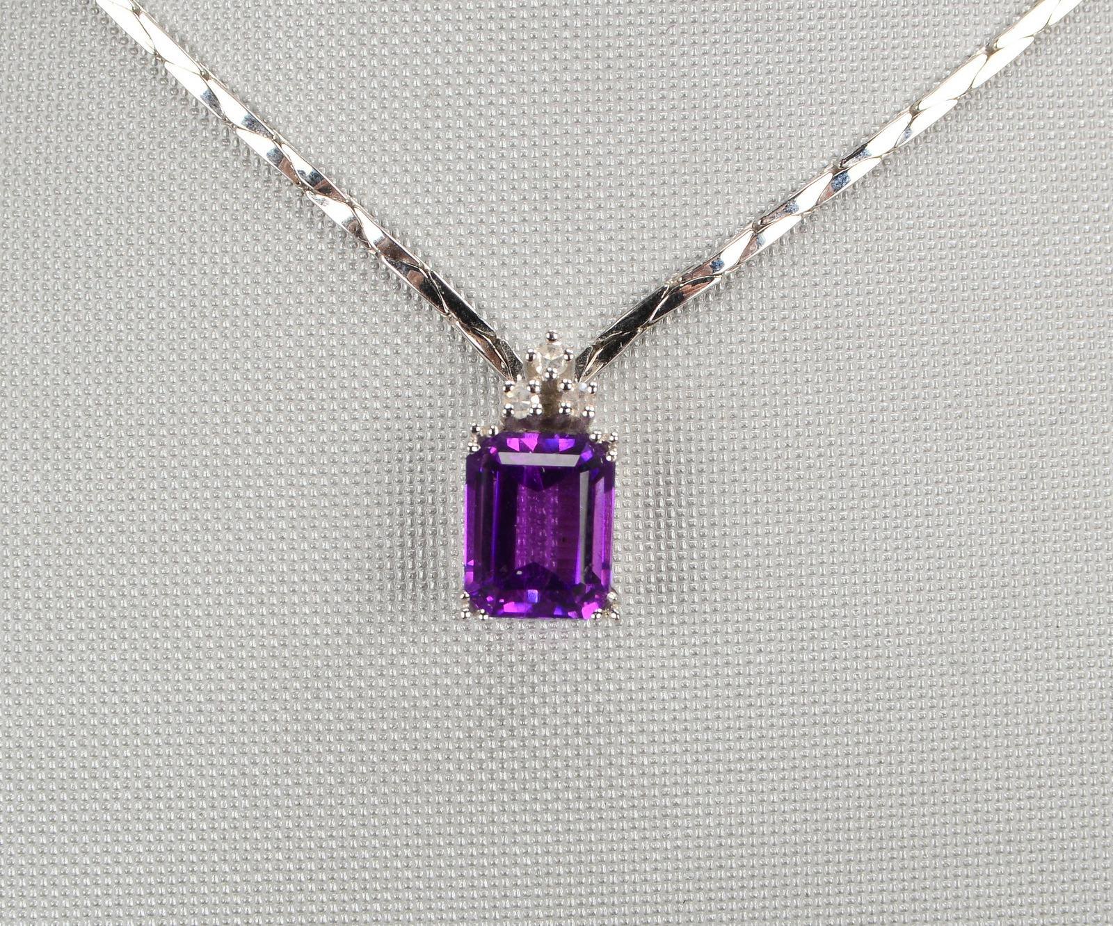 Collier, 585 WG (gest.), mit Amethyst und 3x Diamanten, mit Steckschließe; Länge 44 cm