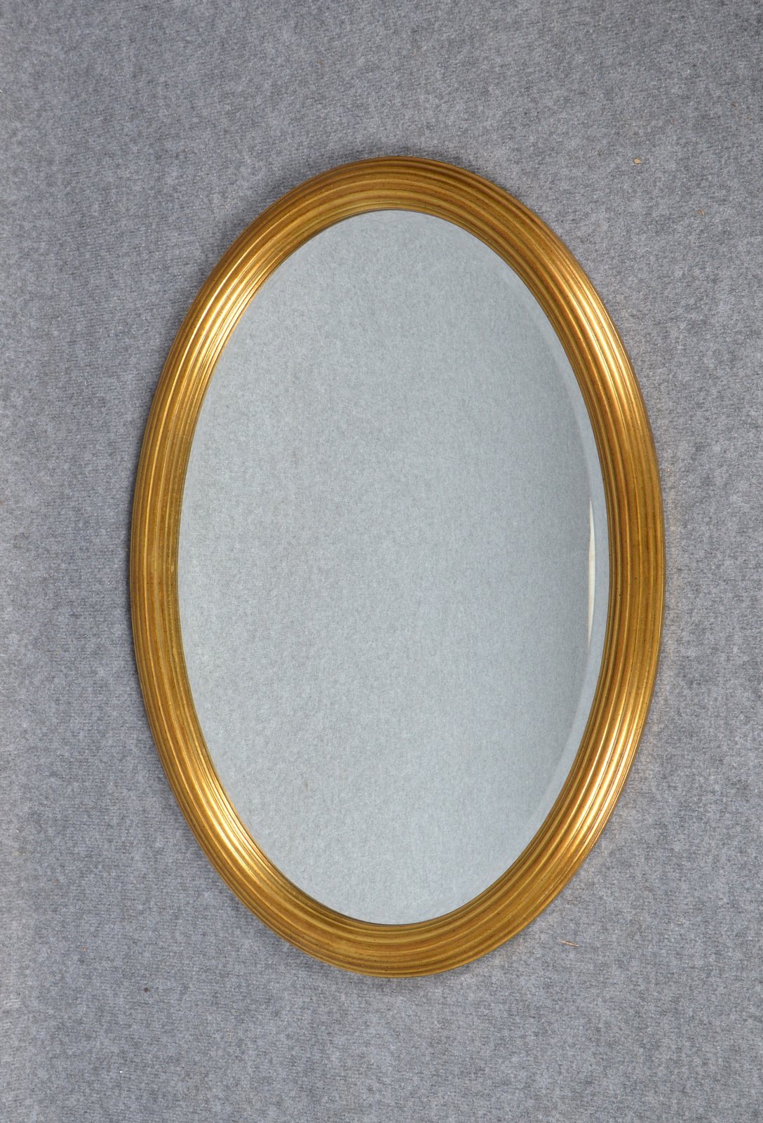 Wandspiegel, ovale Form, Rahmen mit fac. Spiegelglas; Maße 80 x 56 cm