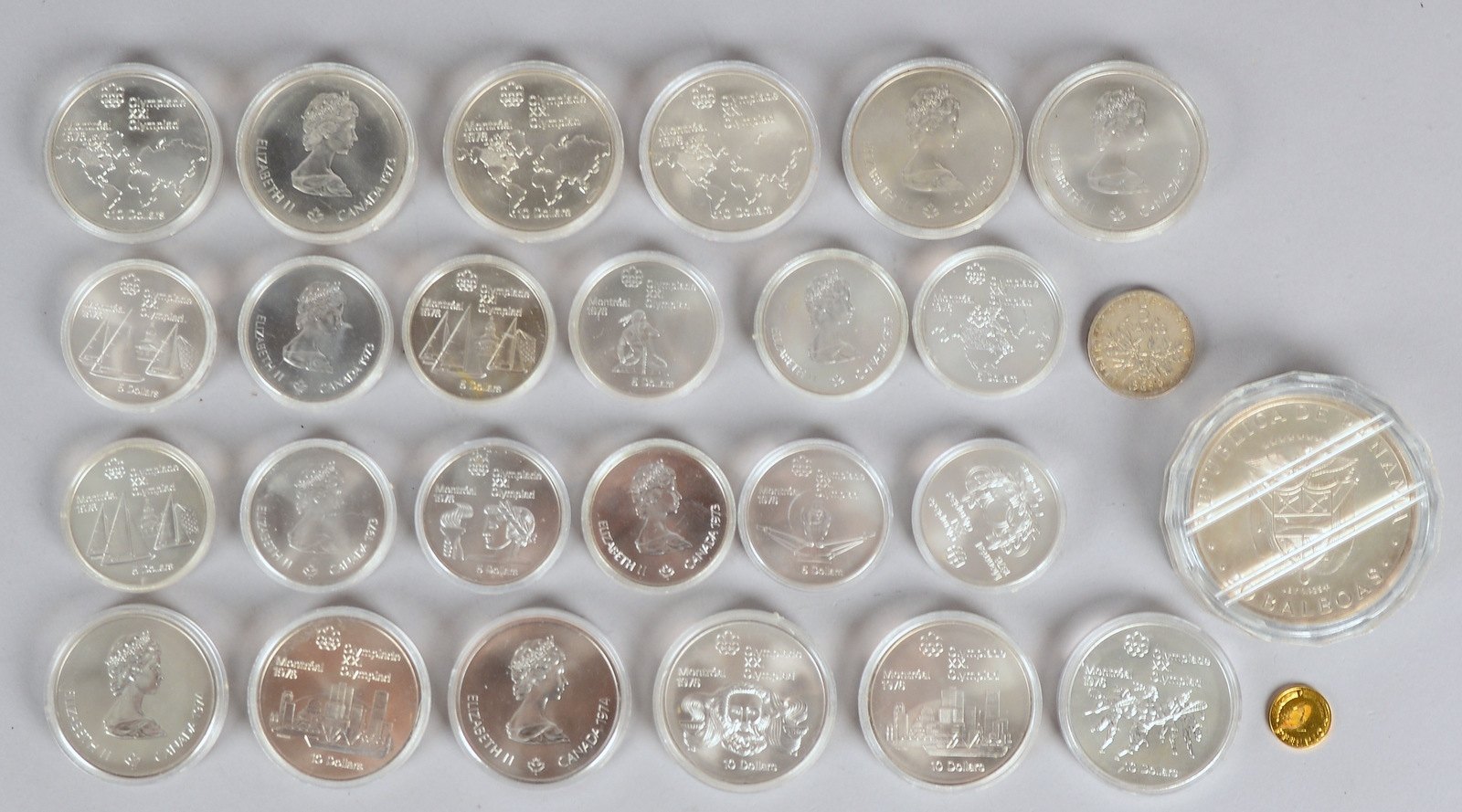 Münzen: 12x '10 $ - Montreal 1976', 12x '5 $ - Montreal 1976', '20 Balboas, S. Bolívar'