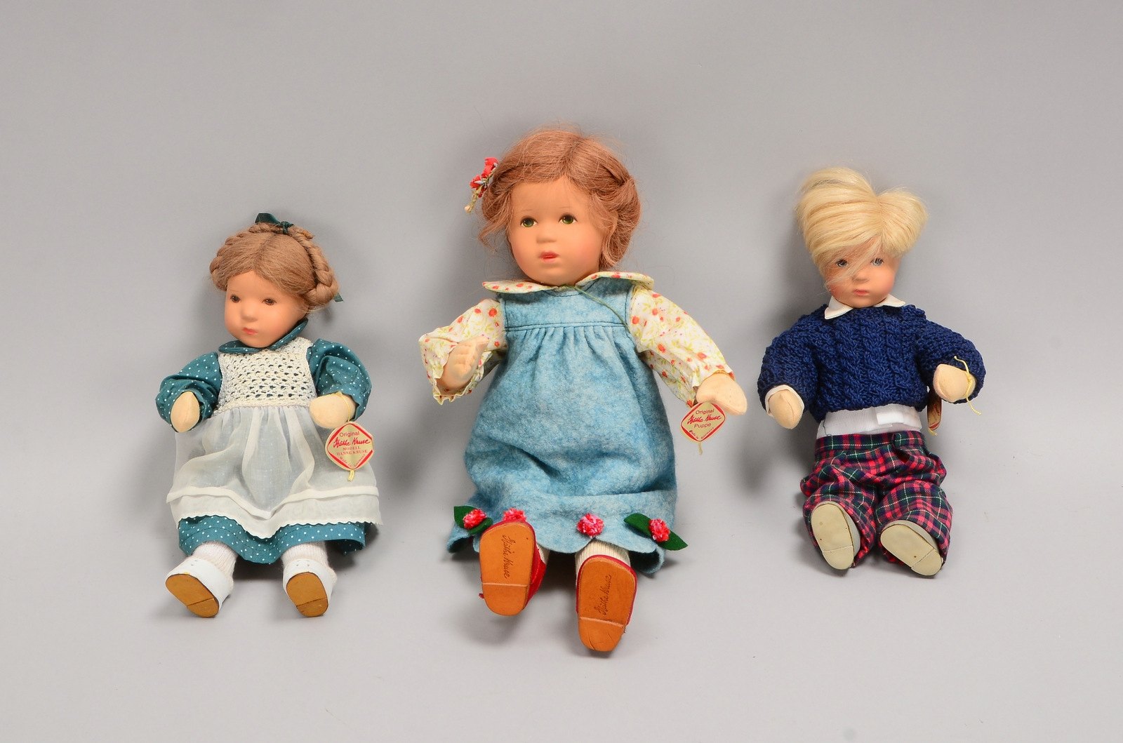 3 Sammlerpuppen, 'Käthe Kruse', Kunststoff-Kopf/Stoffkörper, bekleidet