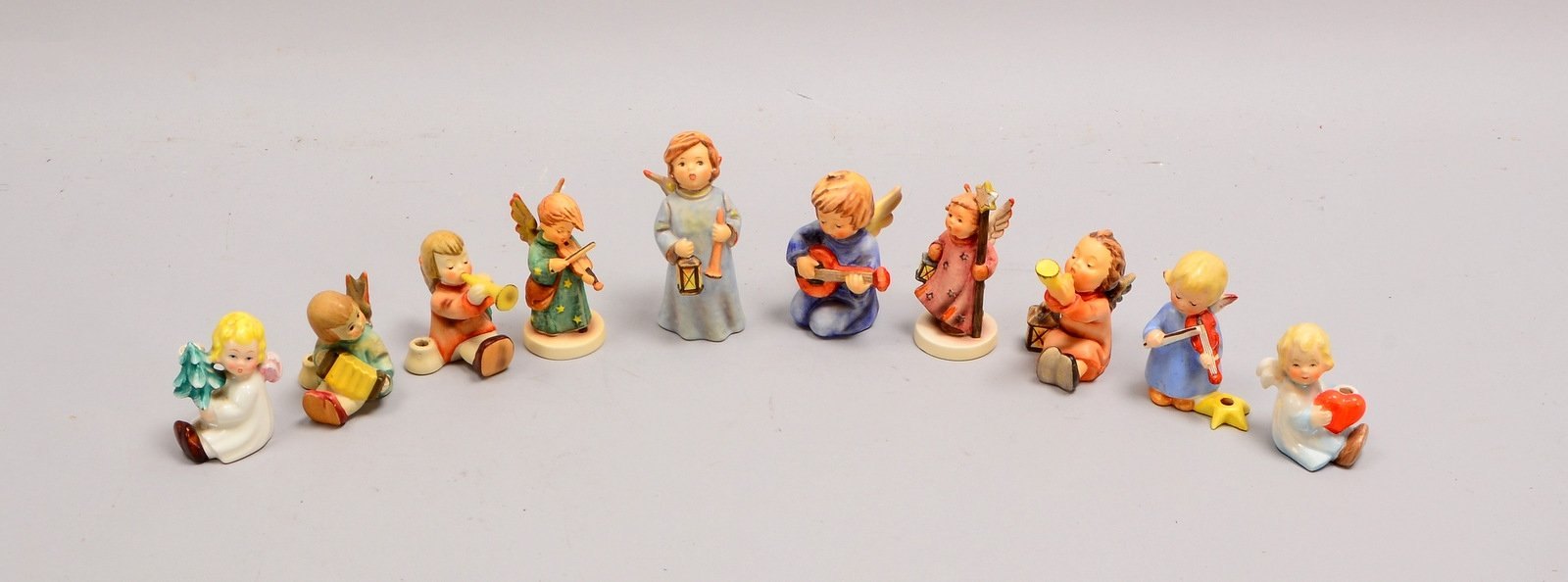 Goebel, kleine 'Hummelfiguren'-Slg., 'Musizierende Weihnachtsengel'; Höhe 6 cm - 10 cm