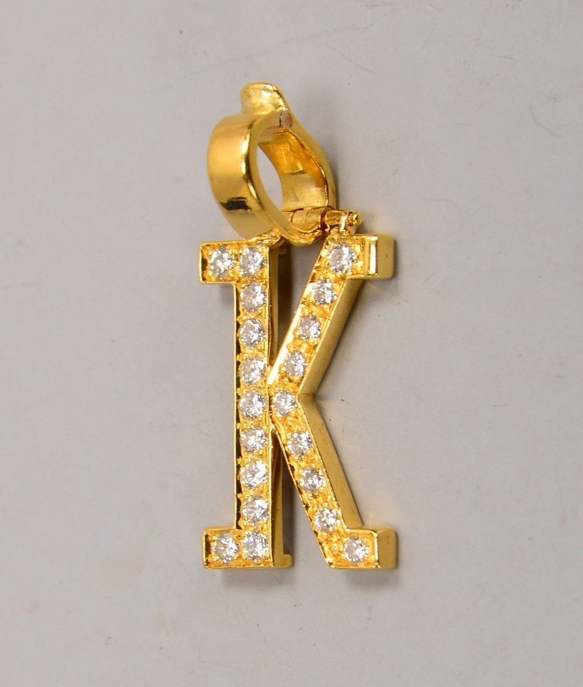 Buchstabenanhänger, 750 GG (gest.), Initiale 'K', mit 20x Brill./zus. ca. 0,32 ct, 'Tw - Vsi'