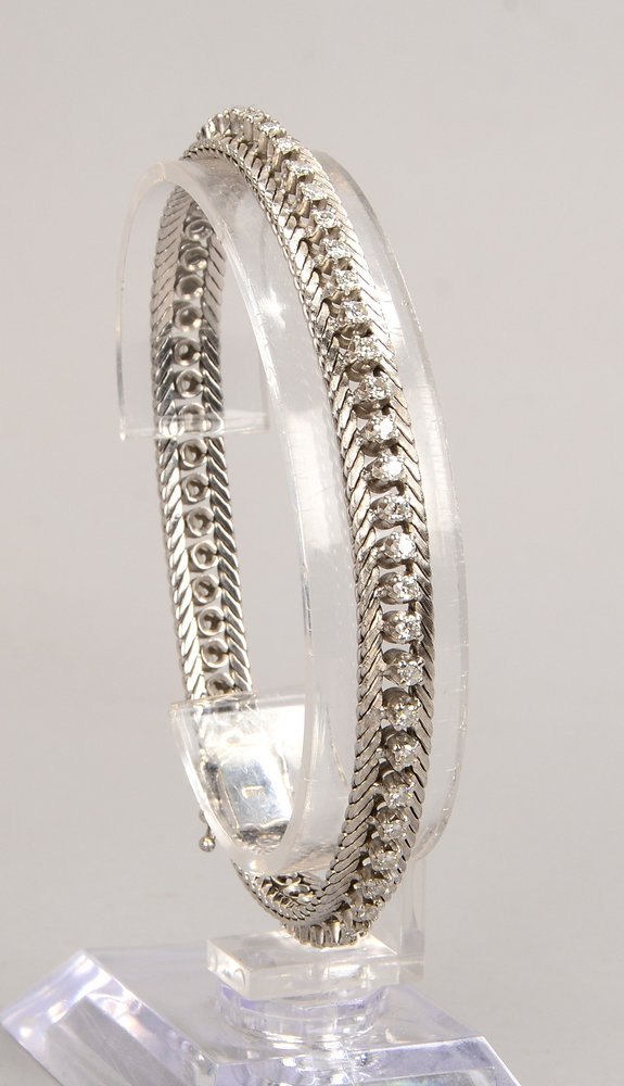 Armband (passend zu Pos. 4108), 750 WG (gest.), mit 57x kl. Brill./zus. ca. 1,60 ct