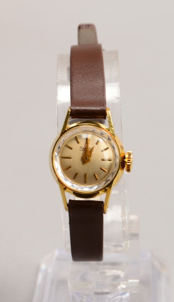 DAU Zentra, Handaufzug, 585 GG-Gehäuse an Lederarmband - läuft an; Ø 17 mm