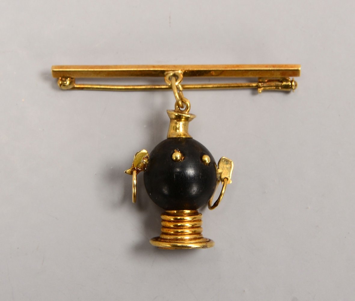 Brosche, 585 GG (gest.), mit figürl. Onyx-Behang ('Afrikaner-Kopf'); Länge 4 cm, Gew. 6 g