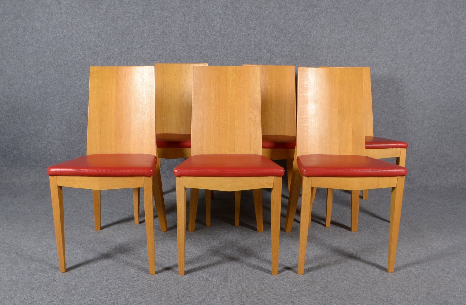 DKK/Hamburg, 6 Stühle, Mod. 'S16', Eiche hell, Sitzfläche mit rotem Kunstleder