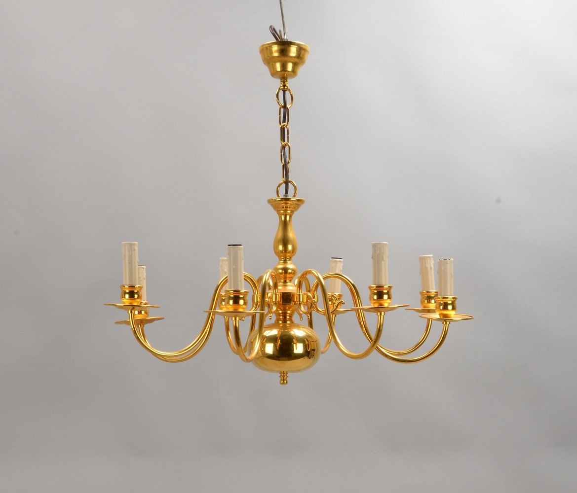 Deckenleuchter, Messing vergoldet, 8-fl./geschw. Arme an Balusterkorpus, an Kette