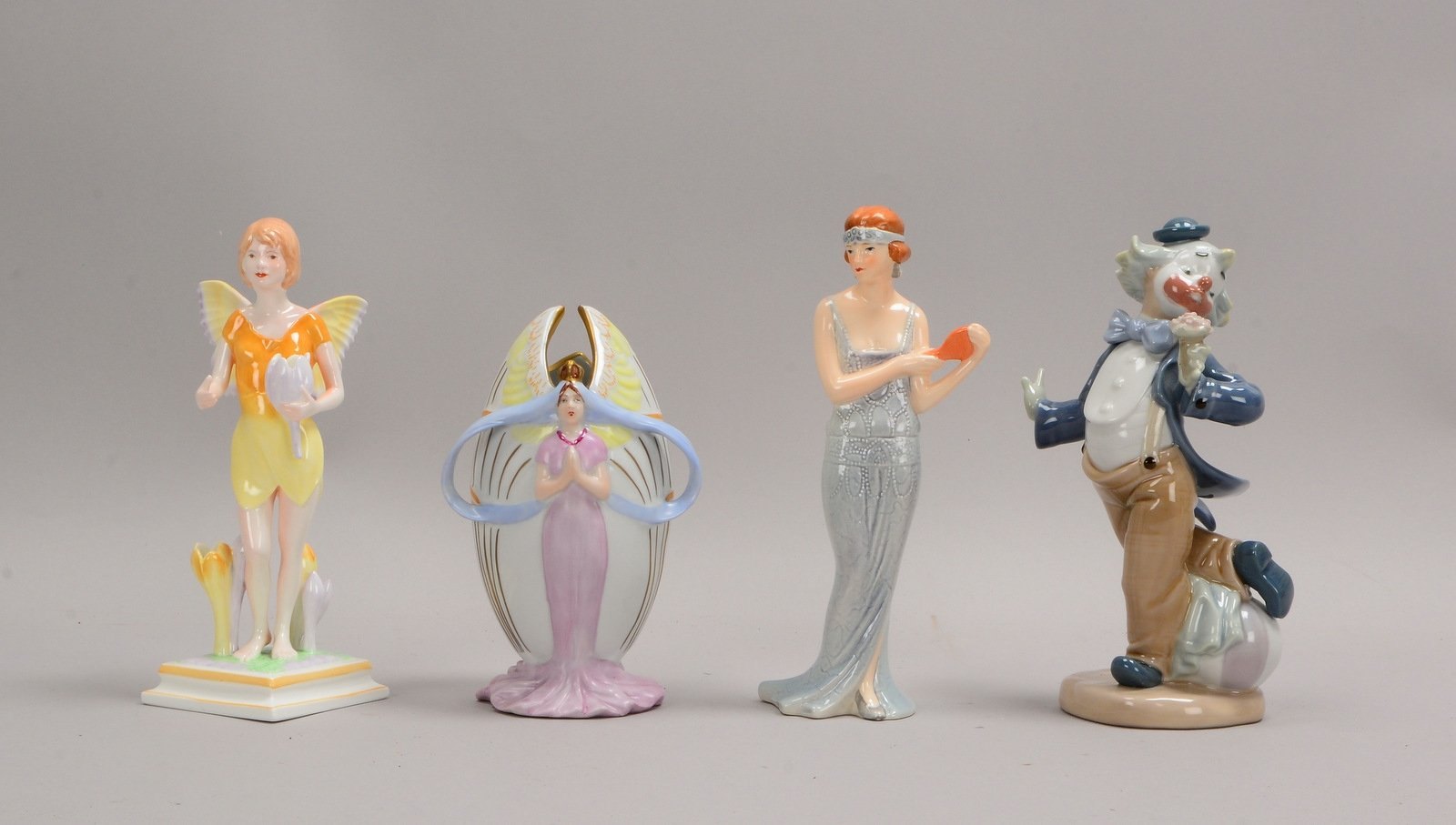 4 Porz.-Figuren-Konvolut, verschiedene Manufakturen und Ausführungen; Höhe 17 - 21 cm