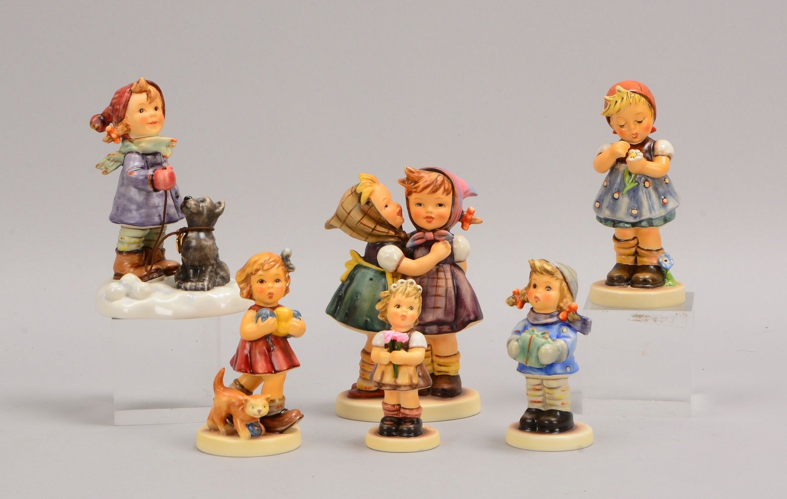 Goebel, kl. Slg. Hummel-Figuren, versch. Größen und Ausführungen, 6 Stück