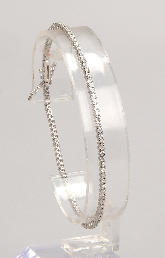 Tennisarmband, 750 WG (gest.), mit 98x Brill./zus. 1,26 ct, 'F - Vsi'; mit Zertifikat!