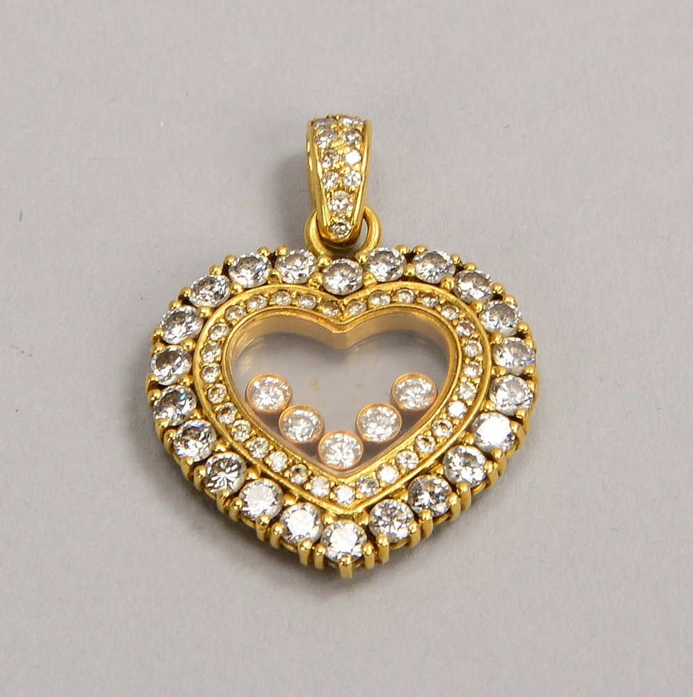 Chopard-Anhänger ('Happy Diamonds'), 750 GG, 'Herz', mit Diam./5x 'tanzend' hinter Glas