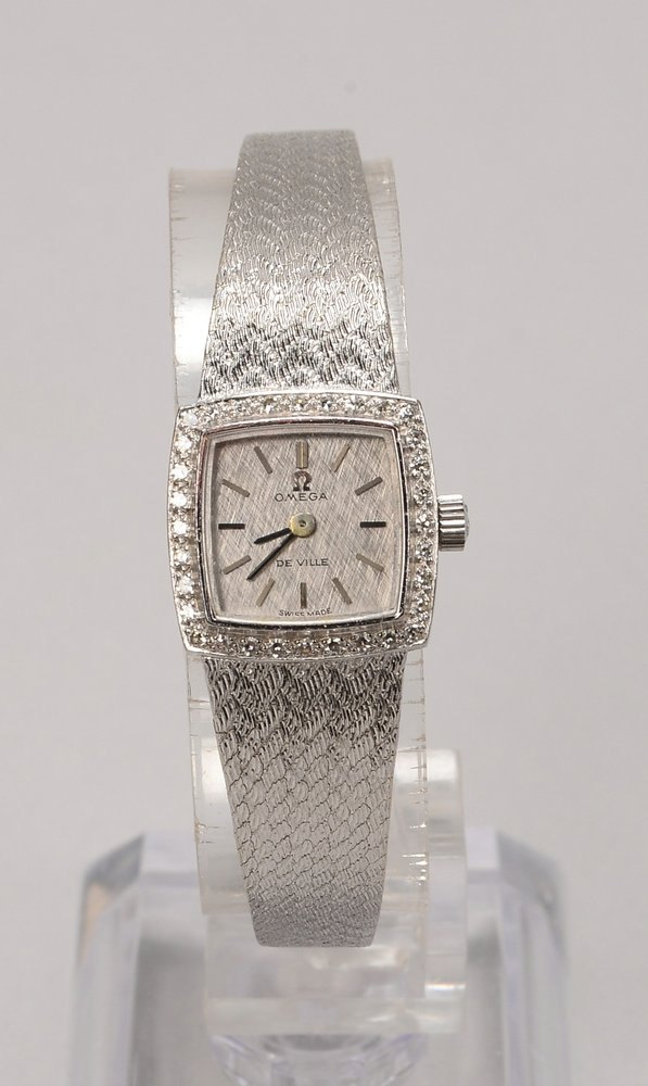 DAU Omega 'De Ville', 750 WG-Geh./Armband, Lünette mit 32x Diam., Quarzwerk!