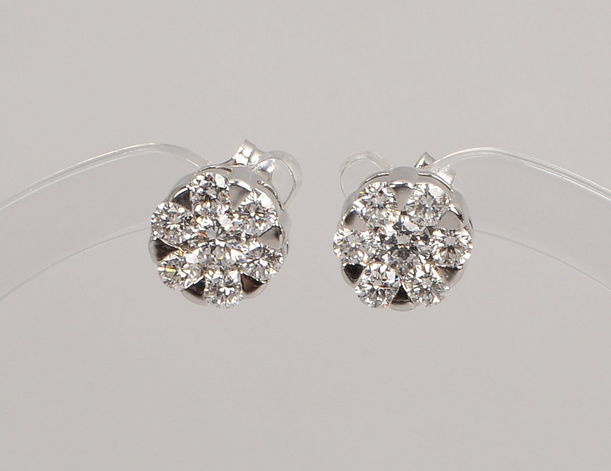Paar Ohrstecker, 750 WG (gest.), jew. besetzt mit 7x kl. Brill./zus. ca. 0,22 ct - mit Zertifikat!