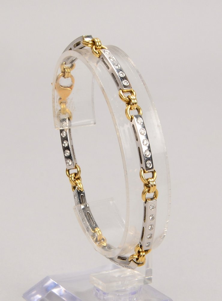 Armband, 585 GG/WG (gest.), mit 35x kl. Brill./zus. 0,70 ct, 'H - Si'; Gew. 13,80 g
