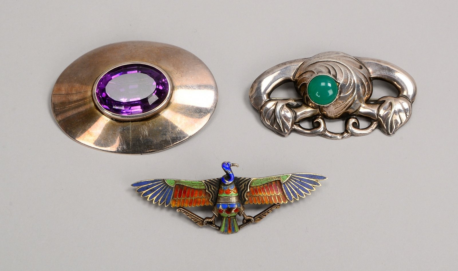 3 Broschen, Silber, teils emailliert - teils mit Schmucksteinbesatz (u.a. Amethyst)