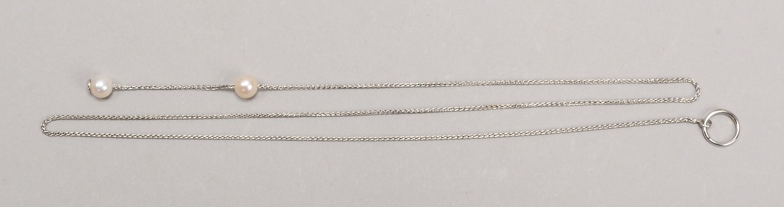 Halskette, 585 WG (gepr.), mit 2-fachem Perlenbesatz; Länge 49 cm, Gew. 3,20 g