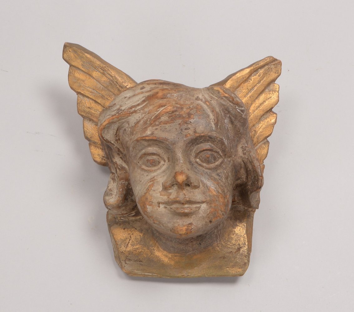 Holzskulptur, 'Engelskopf', Figur mit Restvergoldung; Maße 24 x 21 cm