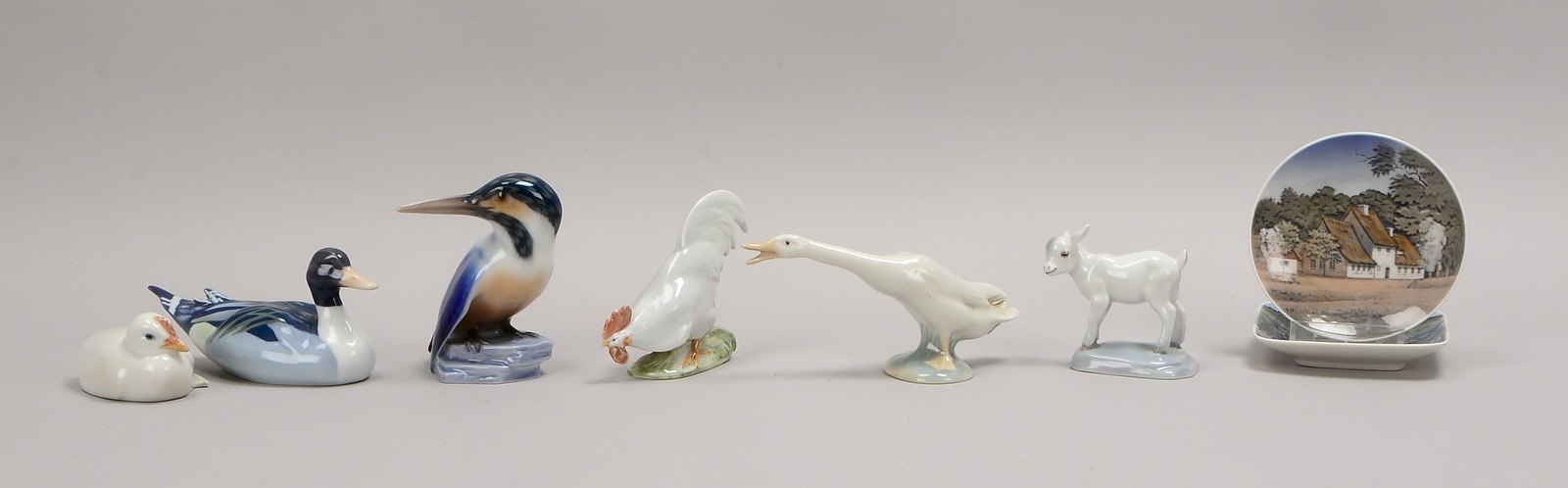 6 Porz.-Tierfiguren: 3x Royal Cop., 2x Bing & Grøndahl, 1x Lladro; dazu 1 Teller