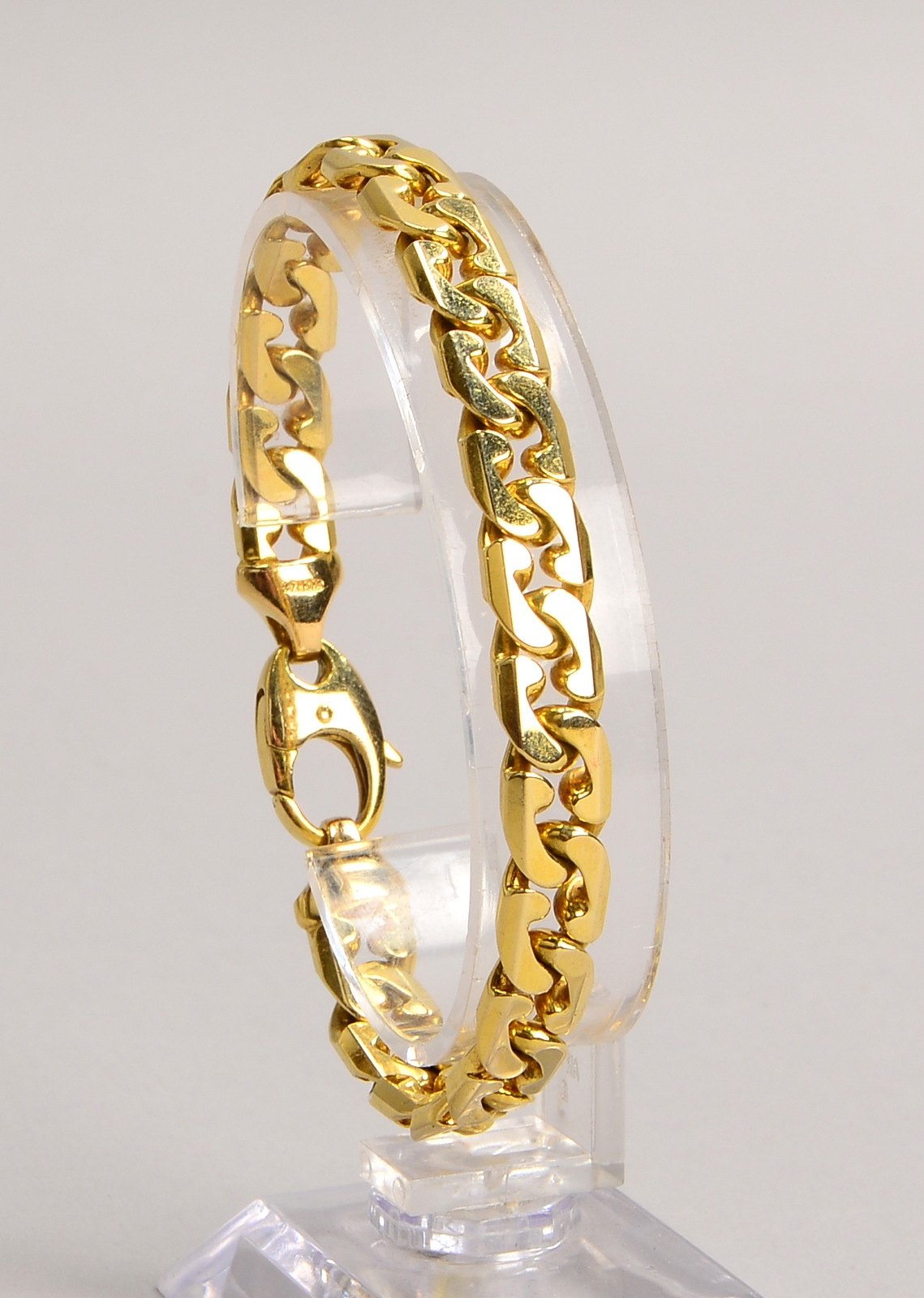 Panzerarmband, 585 GG (gest.), flach., mit Karabinerschließe; Länge 19 cm, Gew. 37 g