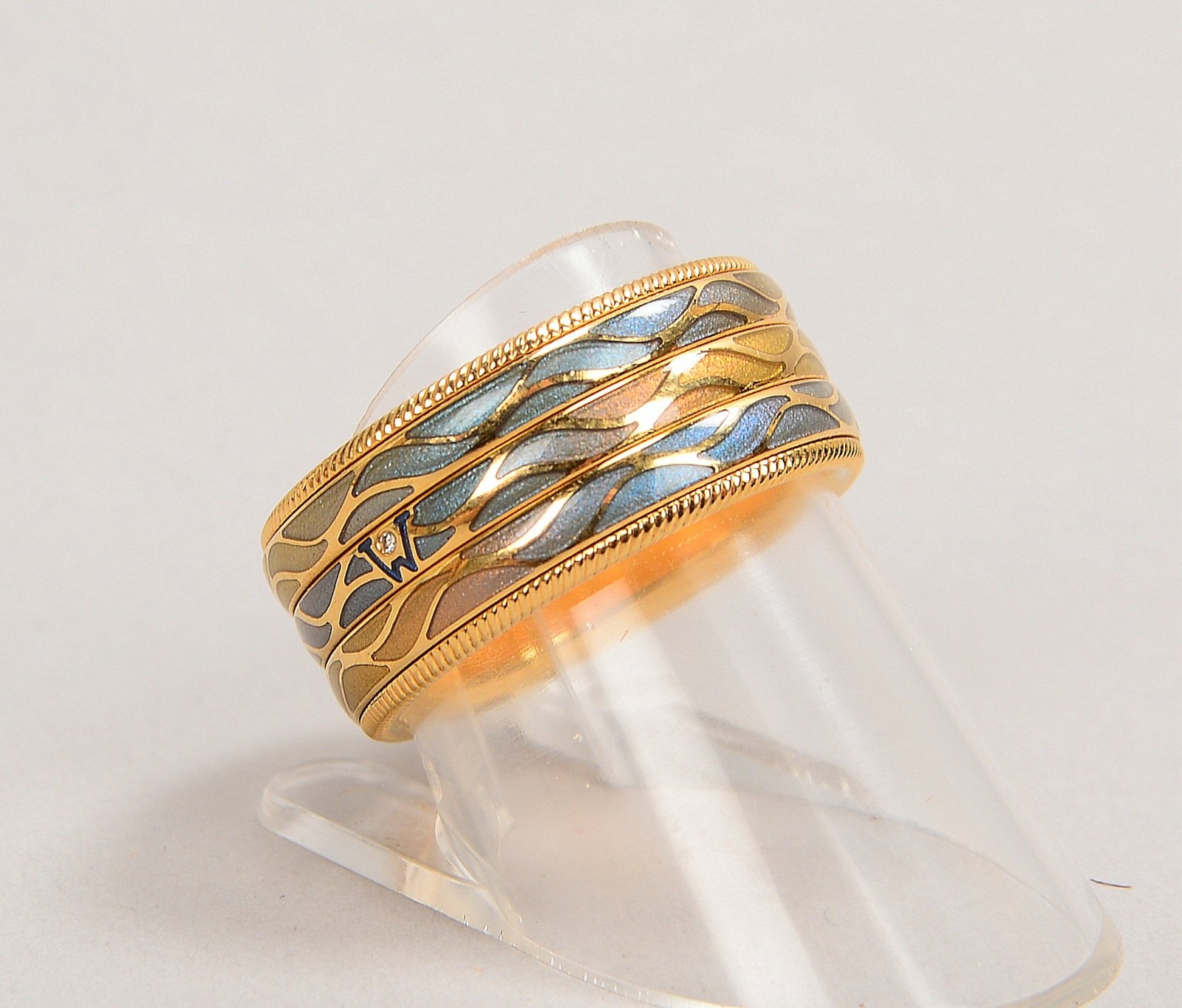 Wellendorff-'Jahresring' (Jg. 2008), in Regenbogenf. emailliert, mit kl. Brill./ca. 0,01 ct