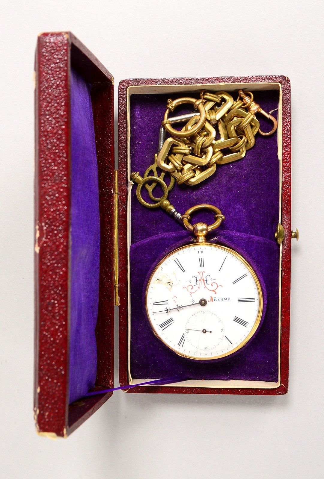 Taschenuhr, mit Schlüsselaufzug, 750 GG, Metall-Staubdeckel bez. ('15 Rubis', u.a.)