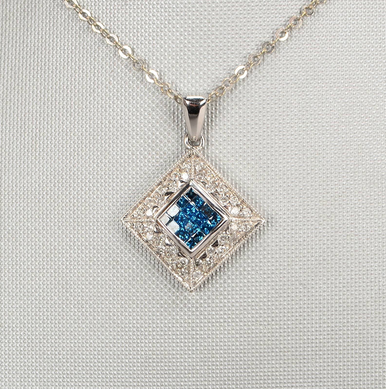 Halskette mit Anhänger, 585 WG (gest.), Anh. mit Diam./ca. 0,40 ct, und Brill./ca. 0,36 ct