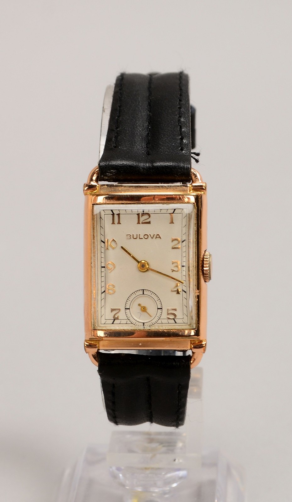 HAU Bulova, 14 kt Roségold/Walzgold-Auflage, Werk läuft, an schw. Band