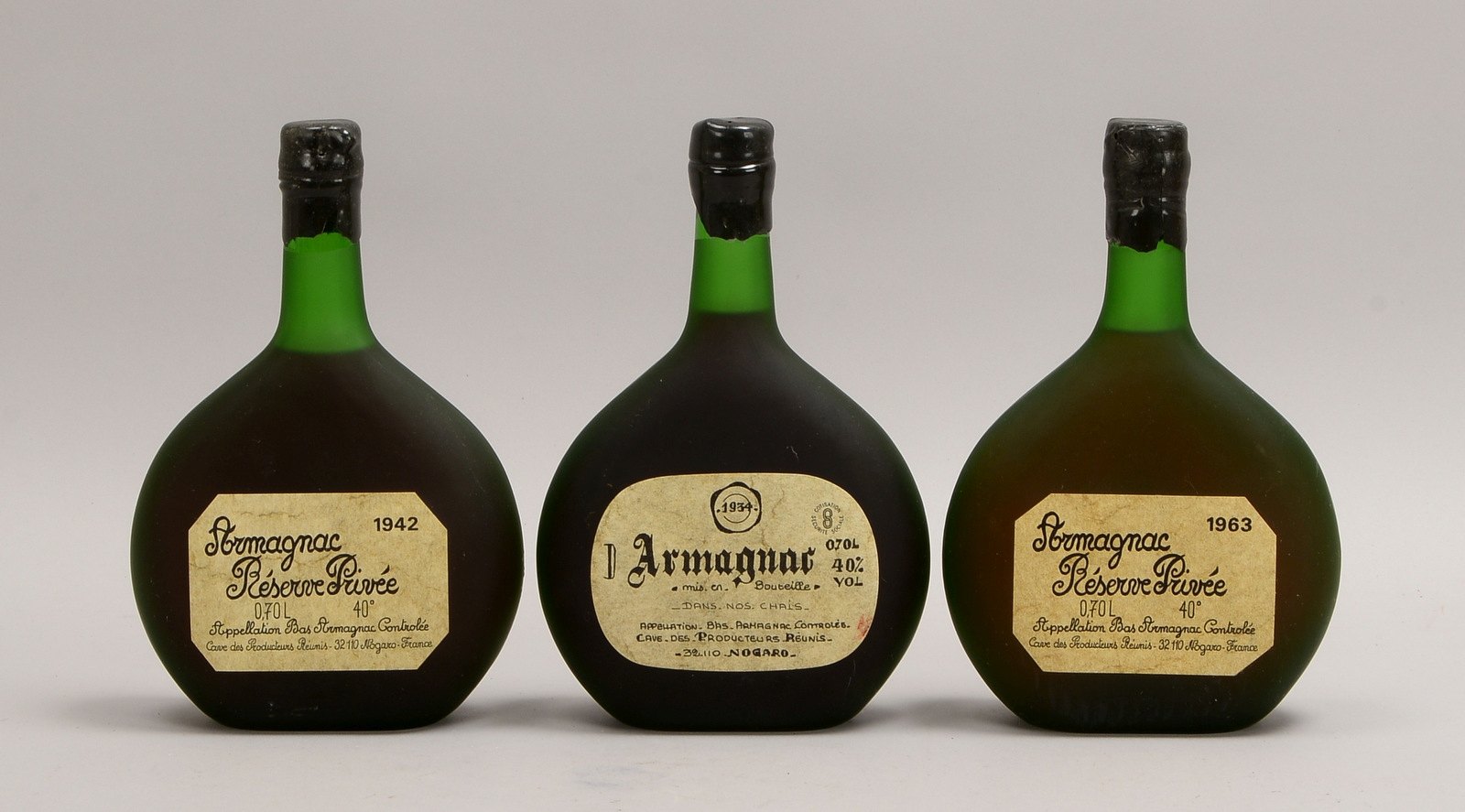 Sammler-Armagnac, 3 Fl.: Armagnac Nogard, Jg. 1934, Jg. 1942, und Jg. 1963