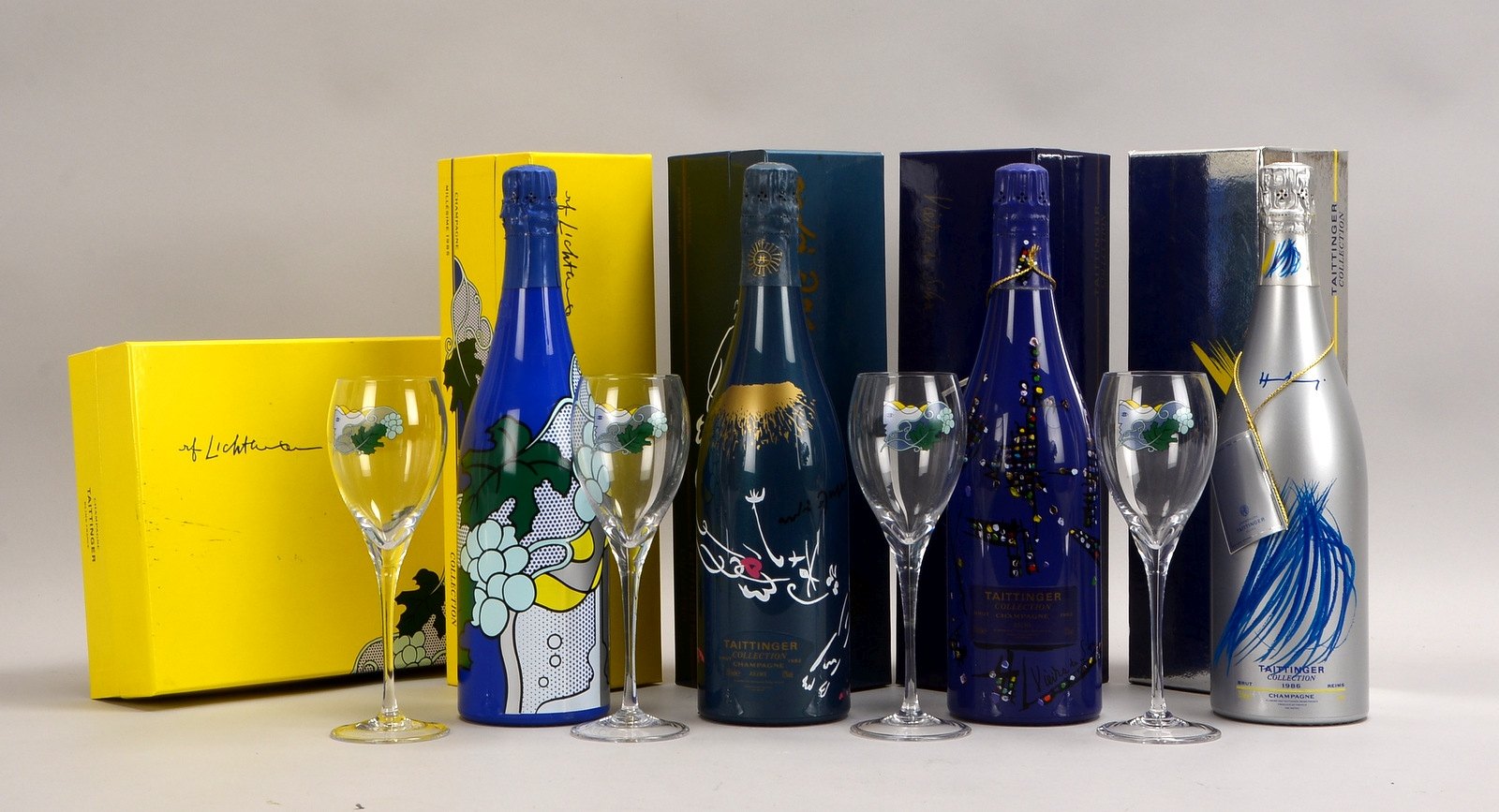 4x Taittinger-Künstlerfl.: Jg. 1982, 1983, 1985, 1986; dazu 4x Taittinger-Künstlergläser