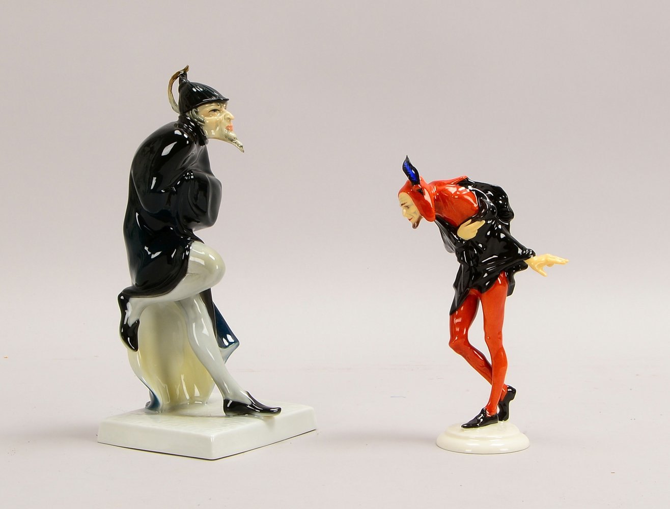 2 Porz.-Figuren, 'Mephisto': 1x Hutschenreuther, Höhe 19 cm, 1x Karl Ens Volkst., Höhe 24 cm
