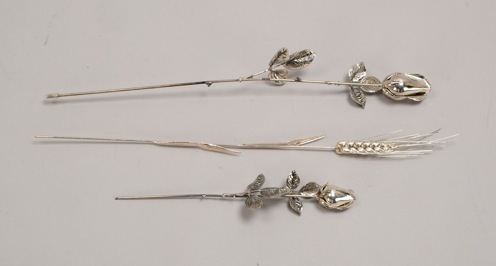 3 Zierobjekte, 925 Silber, florale Ausf.: 2x 'Rose', und 1x 'Kornähre'; Gew. zus. 81 g
