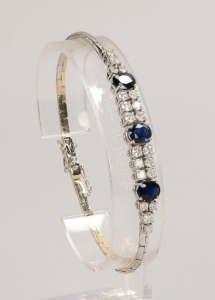 Armband, 750 WG (gest.), mit 3x Saphiren/ca. 2,56 ct, und 20x Brill./ca. 1,39 ct, 'W-P1'