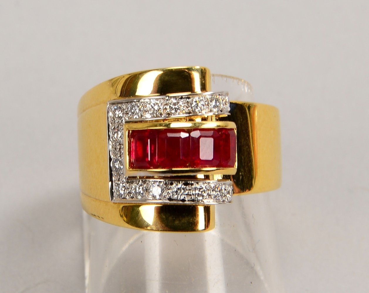 Bandring, 750 GG (gest.), mit 4x Rubinen/ca. 1,0 ct, und 16x Brill./zus. 0,25 ct; RG 56