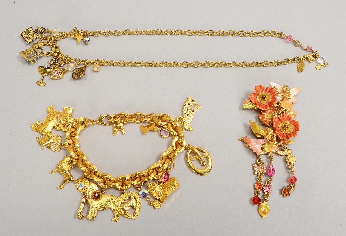 Kirks Folly-Modeschmuck, mit Emaille und farb. Steinen: Collier, Armband und Brosche