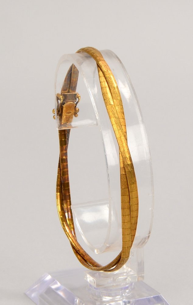 Armband, 585 GG (gest.), 2-reihig geflochten, mit Steckschließe; Länge 20 cm, Gew. 12 g