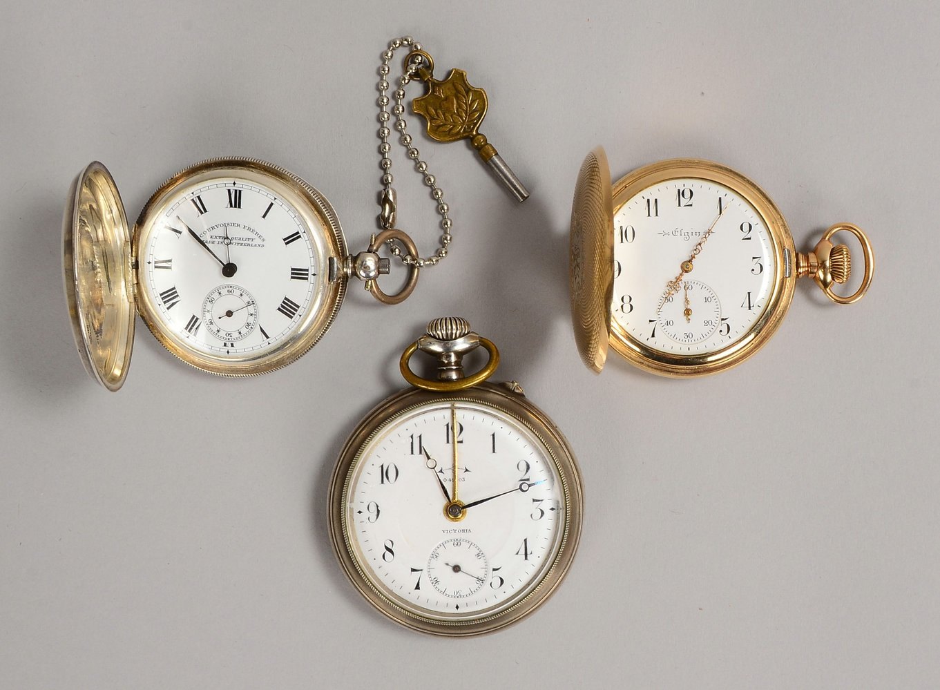 3 Taschenuhren: Courv. Frères, Silber, Schlüsselaufz.; Elgin, Golddoublé; Victoria