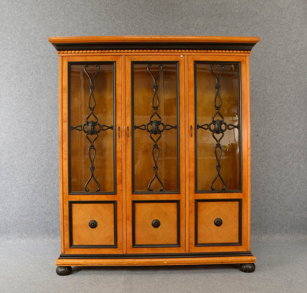 Bücherschrank, Nadelholz mit hellem Furnier/teils ebonisiert, 4-tür./vergl., 17x Einlegeböden