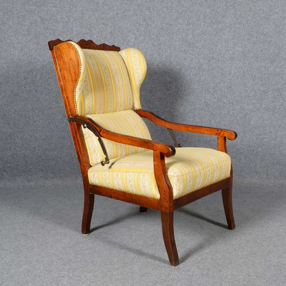 Ohrensessel, Mahagoni, mit Bezugsstoff in Gold-Beige, mit verstellb. Rückenlehne